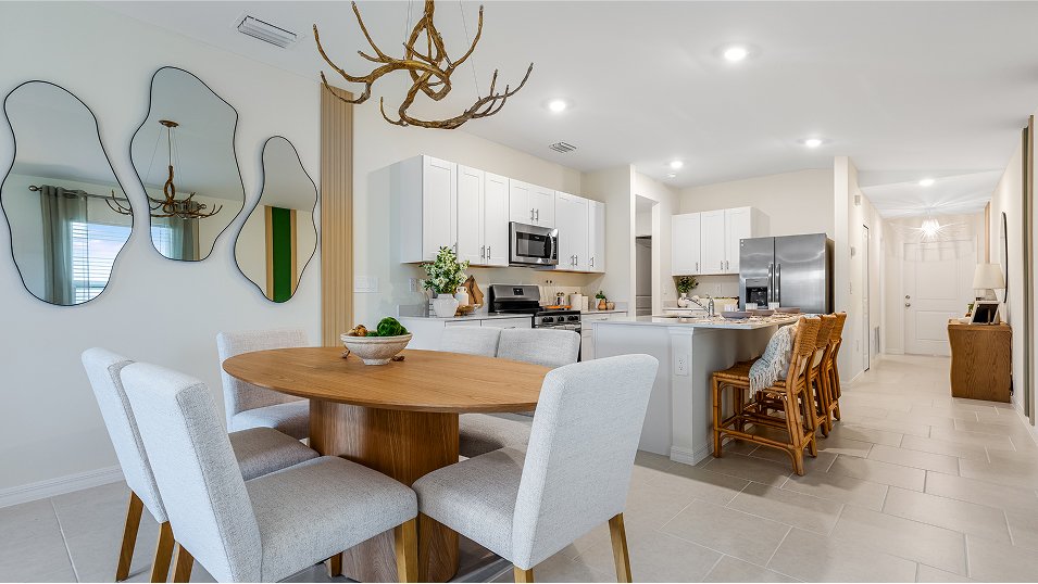Photograph of the dining area in a completed Lennar Belmont model home. Photographed in a Lennar model, not at Turnleaf.