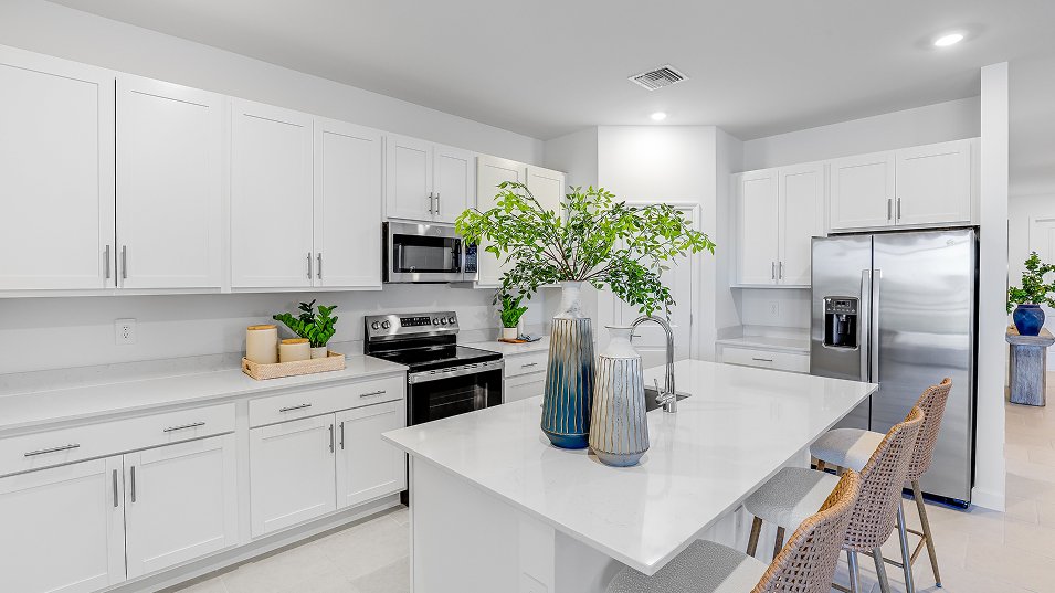 Photograph of the kitchen in a completed Lennar Carson model home. Photographed in a Lennar model, not at Turnleaf.