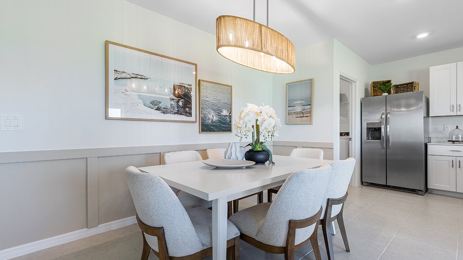 Photograph of the dining area in a completed Lennar Edison model home. Photographed in a Lennar model, not at Turnleaf.