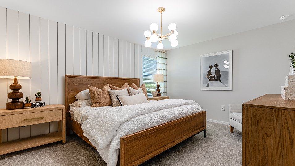 Photograph of the owner's suite in a completed Lennar Edison model home. Photographed in a Lennar model, not at Turnleaf.