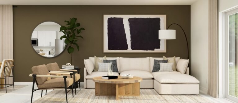 Lennar's own rendering of the family room in the Georgia floor plan, showing a sectional sofa against a dark accent wall beside sliding doors. A rendering supplied by the builder, not a photograph of a completed home at Turnleaf.